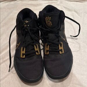 Black and Gold Nike Kyrie Flytrap sneakers